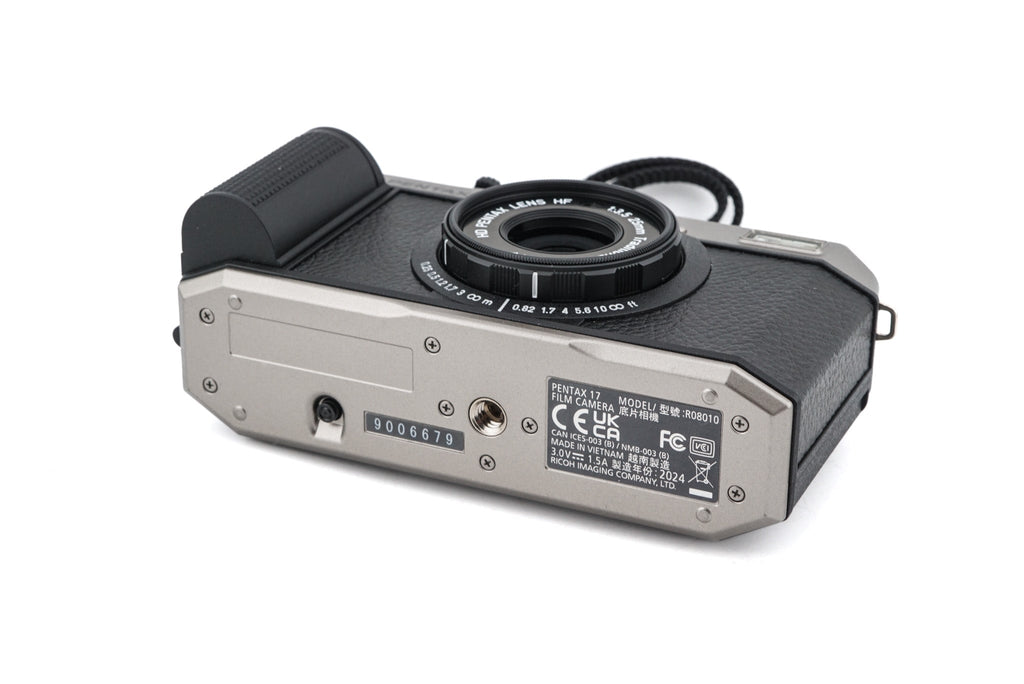 Pentax 17 half-frame camera bottom view on a white background.