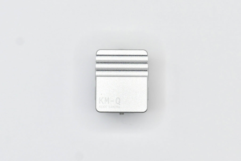 The KMQ chrome back display model from topside on a white background.